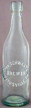 CHARLES SCHWARTZ BREWER EMBOSSED BEER BOTTLE