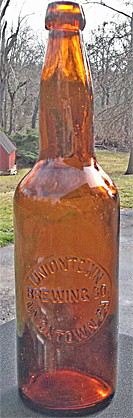 UNIONTOWN BREWING COMPANY EMBOSSED BEER BOTTLE