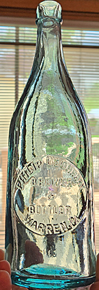 PHILIP LEONHART BREWER & BOTTLER EMBOSSED BEER BOTTLE