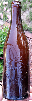 CRESCENT BREWING COMPANY EMBOSSED BEER BOTTLE