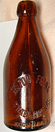 ANTON FRANK WEBER'S WEISS BEER EMBOSSED BEER BOTTLE