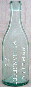 WILLIAM METTE WEISS BEER EMBOSSED BEER BOTTLE