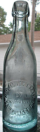 MILWAUKEE LAGER EMBOSSED BEER BOTTLE