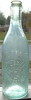 THE GERMANIA BREWING COMPANY EMBOSSED BEER BOTTLE