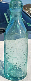 THE GERMANIA BREWING COMPANY EMBOSSED BEER BOTTLE