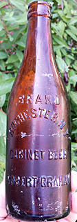 BRAND CABINET BEER EMBOSSED BEER BOTTLE