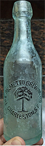 THE PALMETTO BREWING COMPANY EMBOSSED BEER BOTTLE