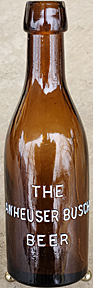 THE ANHEUSER BUSCH BEER EMBOSSED BEER BOTTLE