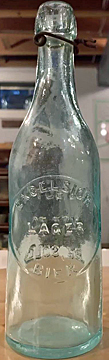 EXCELSIOR LAGER BIER EMBOSSED BEER BOTTLE