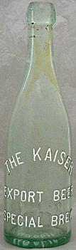 THE KAISER EXPORT BEER EMBOSSED BEER BOTTLE