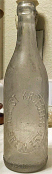 AUGUST KRUEGER'S BREWERY EMBOSSED BEER BOTTLE