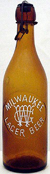 MILWAUKEE LAGER BEER EMBOSSED BEER BOTTLE