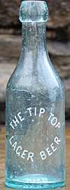 THE TIP TOP LAGER BEER EMBOSSED BEER BOTTLE