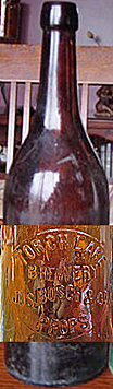 J. BOSCH & CO. TORCH LAKE BREWERY EMBOSSED BEER BOTTLE