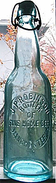 J. P. ROBINSON BOTTLER OF FINE HOME BEER EMBOSSED BEER BOTTLE