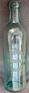 HOME BREWING COMPANY EMBOSSED BEER BOTTLE