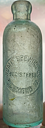 HOME BREWING COMPANY EMBOSSED BEER BOTTLE