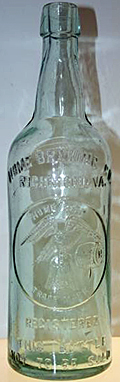 HOME BREWING COMPANY EMBOSSED BEER BOTTLE