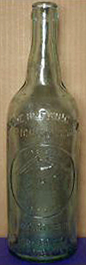 HOME BREWING COMPANY EMBOSSED BEER BOTTLE