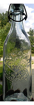 ROBERT PORTNERS BEER EMBOSSED BEER BOTTLE