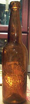 GLOBE BREWERY EMBOSSED BEER BOTTLE