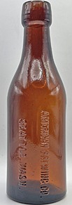 AMERICAN BREWING COMPANY EMBOSSED BEER BOTTLE