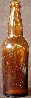 RAINIER BEER SEATTLE BREWING & MALTING COMPANY EMBOSSED BEER BOTTLE