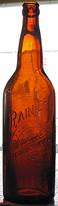 RAINIER BEER SEATTLE BREWING & MALTING COMPANY EMBOSSED BEER BOTTLE