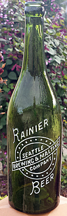 RAINIER BEER SEATTLE BREWING & MALTING COMPANY EMBOSSED BEER BOTTLE