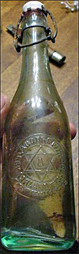 ASHLAND BREWING COMPANY EMBOSSED BEER BOTTLE