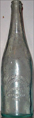 J. LEINENKUGEL BREWING COMPANY EMBOSSED BEER BOTTLE