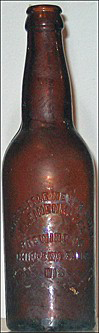 J. LEINENKUGEL BREWING COMPANY EMBOSSED BEER BOTTLE