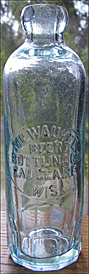 MILWAUKEE BEER BOTTLING COMPANY EMBOSSED BEER BOTTLE