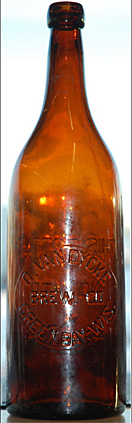 O. VAN DYCKE BREWING COMPANY EMBOSSED BEER BOTTLE