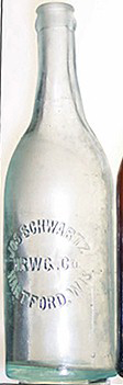 JOSEPH SCHWARTZ BREWING COMPANY EMBOSSED BEER BOTTLE