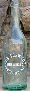 JOSEPH SCHWARTZ BREWING COMPANY EMBOSSED BEER BOTTLE