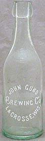 JOHN GUND BREWING COMPANY EMBOSSED BEER BOTTLE