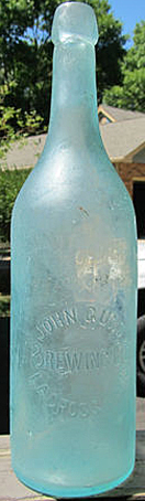 JOHN GUND BREWING COMPANY EMBOSSED BEER BOTTLE