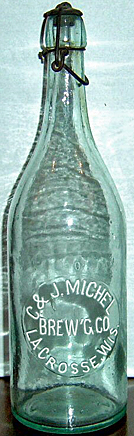 C. & J. MICHEL BREWING COMPANY EMBOSSED BEER BOTTLE