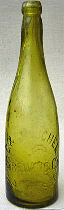 C. & J. MICHEL BREWING COMPANY EMBOSSED BEER BOTTLE