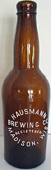 HAUSMANN BREWING COMPANY EMBOSSED BEER BOTTLE