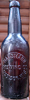 HAUSMANN BREWING COMPANY EMBOSSED BEER BOTTLE