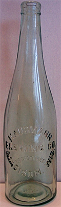 HAUSMANN BREWING COMPANY EMBOSSED BEER BOTTLE