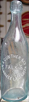 A. GUNTHER & COMPANY FALK'S MILWAUKEE LAGER BEER EMBOSSED BEER BOTTLE