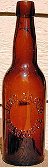 JUNG BREWING COMPANY EMBOSSED BEER BOTTLE