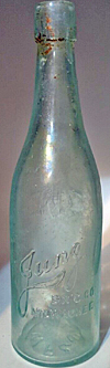 JUNG BREWING COMPANY EMBOSSED BEER BOTTLE