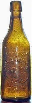 A. H. MANSKE BREWING COMPANY EMBOSSED BEER BOTTLE