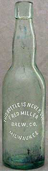 FRED MILLER BREWING COMPANY EMBOSSED BEER BOTTLE