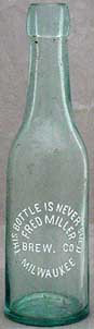 FRED MILLER BREWING COMPANY EMBOSSED BEER BOTTLE