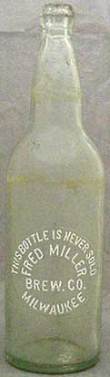 FRED MILLER BREWING COMPANY EMBOSSED BEER BOTTLE